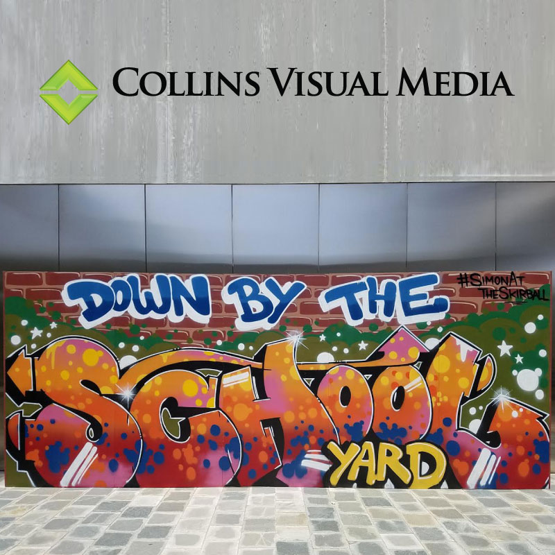 A custom "graffiti" media wall for Paul Simon's 'Down by the School Yard'