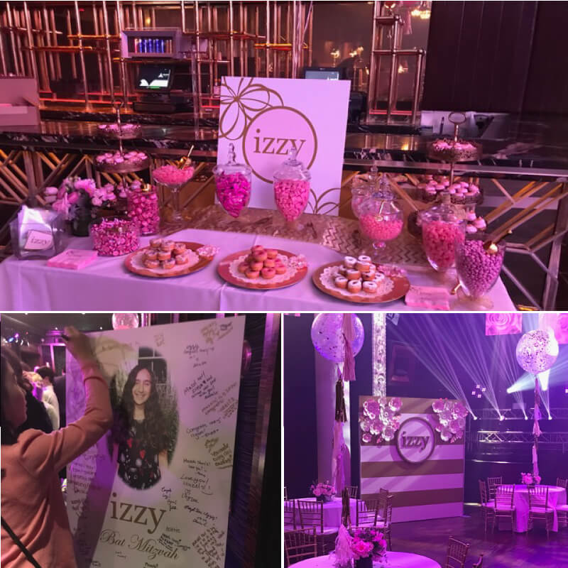 An attractive photo backdrop and tons of signage for Izzy's Bat Mitzvah